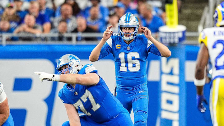 Detroit Lions quarterback Jared Goff (16) talks to center Frank Ragnow (77) Detroit Lions quarterback Jared Goff (16) talks to center Frank Ragnow (77)