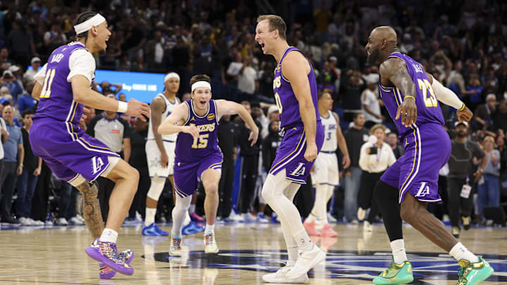 Mar 21, 2026; Orlando, Florida, USA; Los Angeles Lakers guard Luke Kennard (10) reacts with center Jaxson Hayes (11) guard Austin Reaves (15) and forward LeBron James (23) after hitting a game winning basket at the buzzer against the Orlando Magic in the fourth quarter at Kia Center. Mandatory Credit: Nathan Ray Seebeck-Imagn Images Mar 21, 2026; Orlando, Florida, USA; Los Angeles Lakers guard Luke Kennard (10) reacts with center Jaxson Hayes (11) guard Austin Reaves (15) and forward LeBron James (23) after hitting a game winning basket at the buzzer against the Orlando Magic in the fourth quarter at Kia Center. Mandatory Credit: Nathan Ray Seebeck-Imagn Images