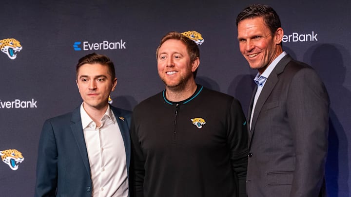 Jacksonville Jaguars new General Manager James Gladstone, left, poses for pictures with Head Coach Liam Coen, center and Executive Vice President of Football Operations Tony Boselli, right, during a press conference Monday morning February 24, 2025 at the Miller Electric Center in Jacksonville, Fla. [Doug Engle/Florida Times-Union]2025