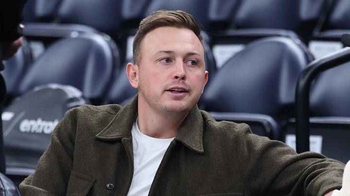 Nov 13, 2025; Salt Lake City, Utah, USA; Utah Jazz president of basketball operations Austin Ainge, left, and owner Ryan Smith, right, speak before a game against the Atlanta Hawks at Delta Center. Mandatory Credit: Rob Gray-Imagn Images