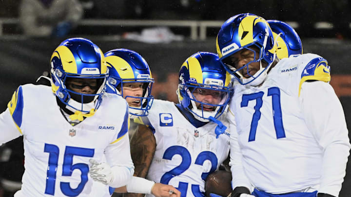 Jan 18, 2026; Chicago, IL, USA; Los Angeles Rams running back Kyren Williams (23) celebrates with wide receiver Konata Mumpfield (15), quarterback Matthew Stafford (9) and offensive tackle Warren McClendon Jr. (71) after scoring a touchdown against the Chicago Bears during the fourth quarter of an NFC Divisional Round game at Soldier Field. Mandatory Credit: Matt Marton-Imagn Images Jan 18, 2026; Chicago, IL, USA; Los Angeles Rams running back Kyren Williams (23) celebrates with wide receiver Konata Mumpfield (15), quarterback Matthew Stafford (9) and offensive tackle Warren McClendon Jr. (71) after scoring a touchdown against the Chicago Bears during the fourth quarter of an NFC Divisional Round game at Soldier Field. Mandatory Credit: Matt Marton-Imagn Images