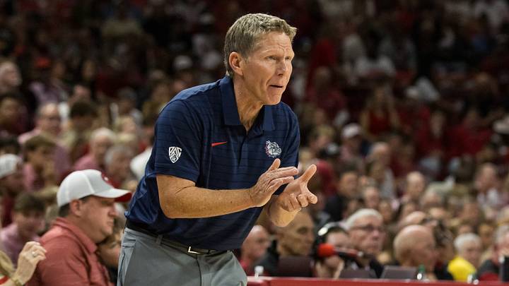 Oct 24, 2026; Fayetteville, AR, USA; Gonzaga Bulldogs head coach Mark Few claps during the first half in the game against the Arkansas Razorbacks at Bud Walton Arena.