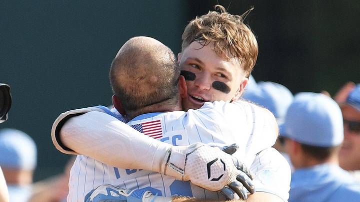June 7, 2026; Chapel Hill, NC, USA; North Carolina Tar Heels outfielder Owen Hull (8) celebrates with head coach Scott Forbes after his game winning hit against the USC Trojans at Boshamer Stadium. Mandatory Credit: Zachary Taft-Imagn Images June 7, 2026; Chapel Hill, NC, USA; North Carolina Tar Heels outfielder Owen Hull (8) celebrates with head coach Scott Forbes after his game winning hit against the USC Trojans at Boshamer Stadium. Mandatory Credit: Zachary Taft-Imagn Images