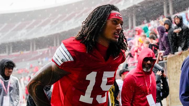 Wide receiver Chris Henry Jr. (15) walks off the field in the rain after the Ohio State football spring game at Ohio Stadium on Saturday, April 18, 2026 in Columbus, Ohio.