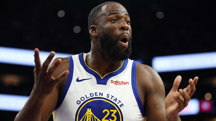 Dec 18, 2025; Phoenix, Arizona, USA; Golden State Warriors forward Draymond Green (23) reacts against the Phoenix Suns in the second half at Mortgage Matchup Center. Mandatory Credit: Mark J. Rebilas-Imagn Images