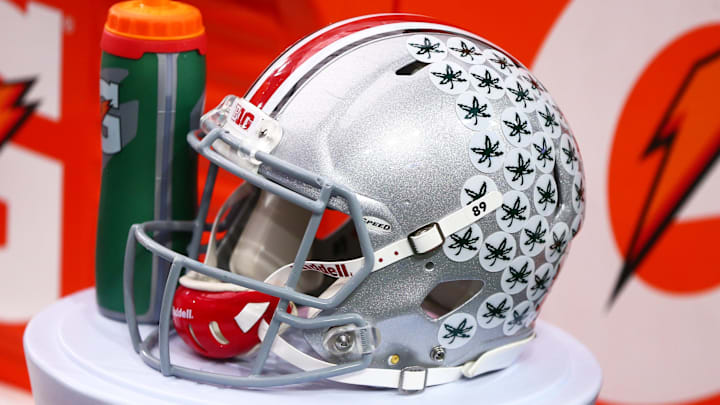 Jan 1, 2016; Glendale, AZ, USA; Detailed view of an Ohio State Buckeyes helmet on the sideline during the 2016 Fiesta Bowl against the Notre Dame Fighting Irish at University of Phoenix Stadium. The Buckeyes defeated the Fighting Irish 44-28. Mandatory Credit: Mark J. Rebilas-Imagn Images