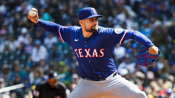 Apr 13, 2025; Seattle, Washington, USA; Texas Rangers starting pitcher Nathan Eovaldi (17) throws against the Seattle Mariners during the first inning at T-Mobile Park. Apr 13, 2025; Seattle, Washington, USA; Texas Rangers starting pitcher Nathan Eovaldi (17) throws against the Seattle Mariners during the first inning at T-Mobile Park.