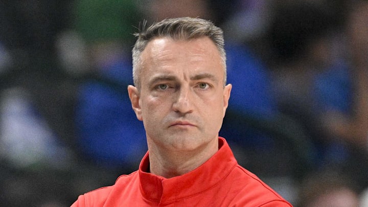 Toronto Raptors head coach Darko Rajakovic looks on during the first quarter against the Dallas Mavericks. Toronto Raptors head coach Darko Rajakovic looks on during the first quarter against the Dallas Mavericks.