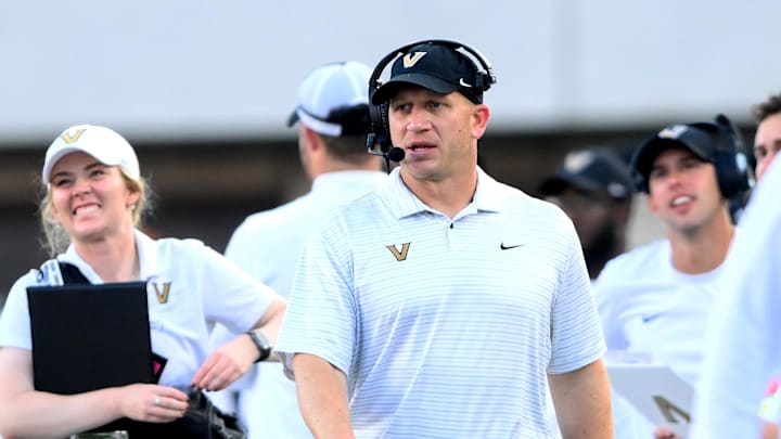 Oct 5, 2024; Nashville, Tennessee, USA; Vanderbilt Commodores head coach Clark Lea walks the sidelines against the Alabama Crimson Tide during the second half at FirstBank Stadium. Oct 5, 2024; Nashville, Tennessee, USA; Vanderbilt Commodores head coach Clark Lea walks the sidelines against the Alabama Crimson Tide during the second half at FirstBank Stadium.