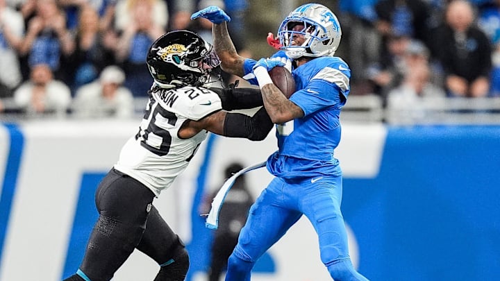 Detroit Lions wide receiver Jameson Williams (9) is pushed out of bound by Jacksonville Jaguars safety Antonio Johnson (26) during the first half at Ford Field in Detroit on Sunday, Nov. 17, 2024. Detroit Lions wide receiver Jameson Williams (9) is pushed out of bound by Jacksonville Jaguars safety Antonio Johnson (26) during the first half at Ford Field in Detroit on Sunday, Nov. 17, 2024.