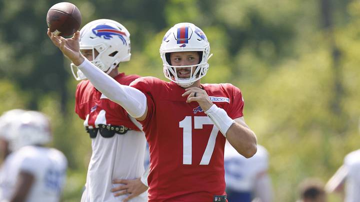 Buffalo Bills quarterback Josh Allen passes the football during joint training camp practice with the Chicago Bears.