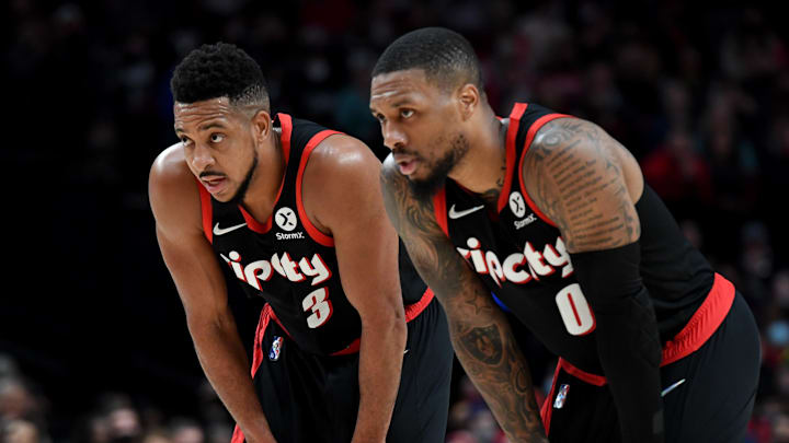 Nov 15, 2021; Portland, Oregon, USA; Portland Trail Blazers guard CJ McCollum (3) speaks with guard Damian Lillard (0) during the second half of the game against the Toronto Raptors at Moda Center. The Blazers won 118-113.Mandatory Credit: Steve Dykes-Imagn Images Nov 15, 2021; Portland, Oregon, USA; Portland Trail Blazers guard CJ McCollum (3) speaks with guard Damian Lillard (0) during the second half of the game against the Toronto Raptors at Moda Center. The Blazers won 118-113.Mandatory Credit: Steve Dykes-Imagn Images