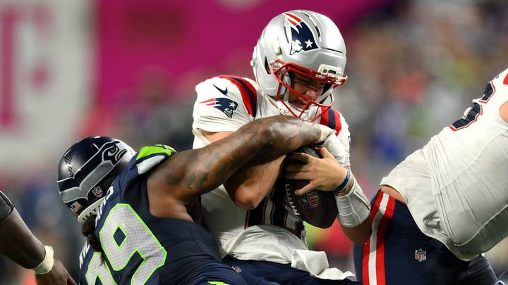 Seattle Seahawks defensive tackle Leonard Williams sacks New England Patriots quarterback Drake Maye Seattle Seahawks defensive tackle Leonard Williams sacks New England Patriots quarterback Drake Maye
