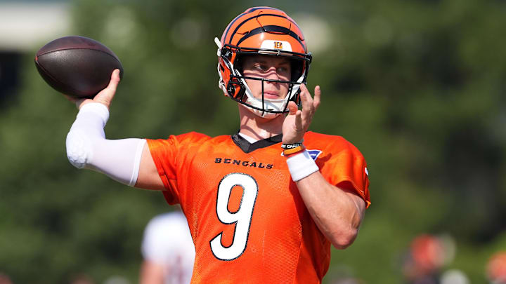 Jul 25, 2025; Cincinnati, OH, USA; Cincinnati Bengals quarterback Joe Burrow (9) throws during training camp practice. Mandatory Credit: Kareem Elgazzar-Imagn Images