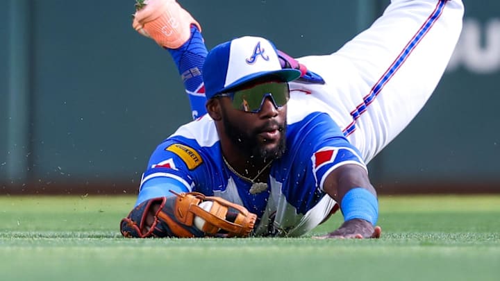 May 24, 2025; Atlanta, Georgia, USA; Atlanta Braves center fielder Michael Harris II (23) catches a fly ball against the San Diego Padres in the eighth inning at Truist Park. Mandatory Credit: Brett Davis-Imagn Images
