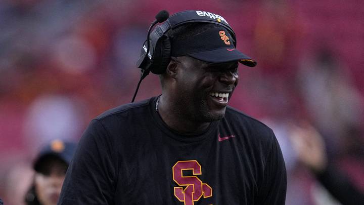 Sep 2, 2023; Los Angeles, California, USA; Southern California Trojans head coach Lincoln Riley (leff) and wide receivers coach Dennis Simmons react against the Nevada Wolf Pack in the second half at United Airlines Field at Los Angeles Memorial Coliseum. Mandatory Credit: Kirby Lee-USA TODAY Sports Sep 2, 2023; Los Angeles, California, USA; Southern California Trojans head coach Lincoln Riley (leff) and wide receivers coach Dennis Simmons react against the Nevada Wolf Pack in the second half at United Airlines Field at Los Angeles Memorial Coliseum. Mandatory Credit: Kirby Lee-USA TODAY Sports