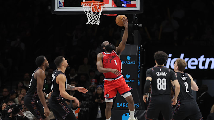 Jan 9, 2026; Brooklyn, New York, USA; Los Angeles Clippers guard James Harden (1) drives to the basket against Brooklyn Nets center Day'ron Sharpe (20) and forward Michael Porter Jr. (17) and guard Nolan Traore (88) and forward Danny Wolf (2) during the third quarter at Barclays Center. Mandatory Credit: Brad Penner-Imagn Images Jan 9, 2026; Brooklyn, New York, USA; Los Angeles Clippers guard James Harden (1) drives to the basket against Brooklyn Nets center Day'ron Sharpe (20) and forward Michael Porter Jr. (17) and guard Nolan Traore (88) and forward Danny Wolf (2) during the third quarter at Barclays Center. Mandatory Credit: Brad Penner-Imagn Images