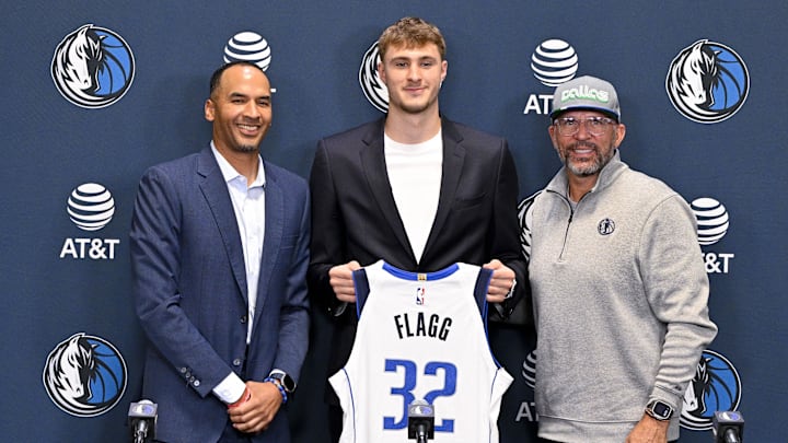 Jun 27, 2025; (from left) Dallas general manager Nico Harrison, first overall pick Cooper Flagg, and head coach Jason Kidd pose for a photo at the Mavericks' practice facility. Credit: Jerome Miron-Imagn Images