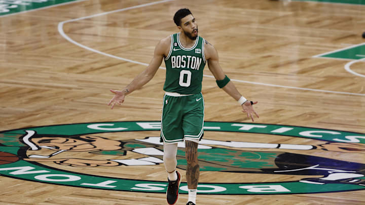 May 14, 2023; Boston, Massachusetts, USA; Boston Celtics forward Jayson Tatum (0) celebrates after making a three point basket against the Philadelphia 76ers during the second half of game seven of the 2023 NBA playoffs at TD Garden. Mandatory Credit: Winslow Townson-Imagn Images