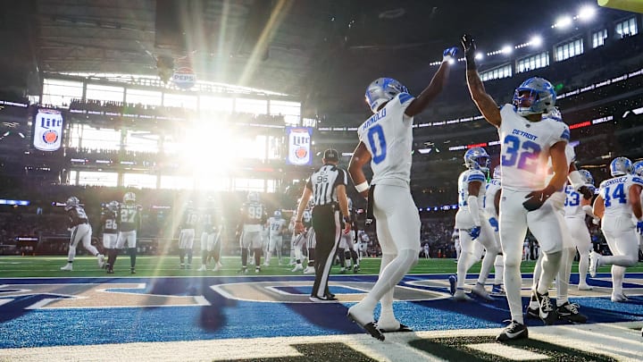 Detroit Lions safety Brian Branch celebrates with cornerback Terrion Arnold after an interception against the Dallas Cowboys. Detroit Lions safety Brian Branch celebrates with cornerback Terrion Arnold after an interception against the Dallas Cowboys.