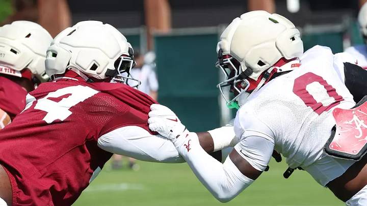 Alabama Offensive Lineman Jayvin James (54) blocks Linebacker Yhonzae Pierre (0) during practice at Thomas-Drew Practice Fields in Tuscaloosa, AL on Thursday, Apr 9, 2026. Alabama Offensive Lineman Jayvin James (54) blocks Linebacker Yhonzae Pierre (0) during practice at Thomas-Drew Practice Fields in Tuscaloosa, AL on Thursday, Apr 9, 2026.