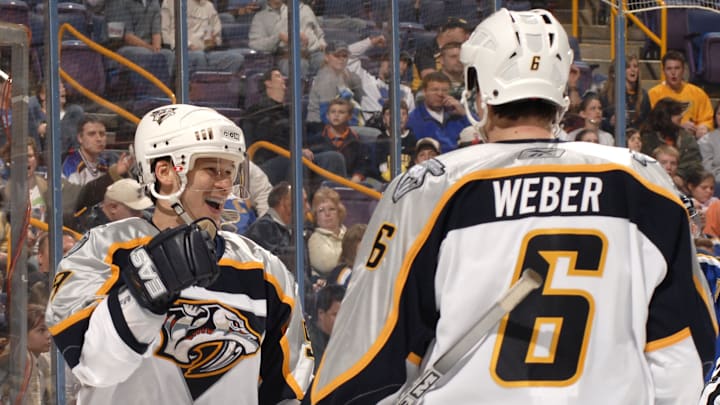 Apr 6, 2006; St. Louis, MO, USA;  Nashville Predators forward Paul Kariya (9) celebrates his third period goal against the St. Louis Blues at the Savvis Center in St. Louis, MO. Mandatory Credit:Scott Rovak-Imagn Images Copyright © Scott Rovak