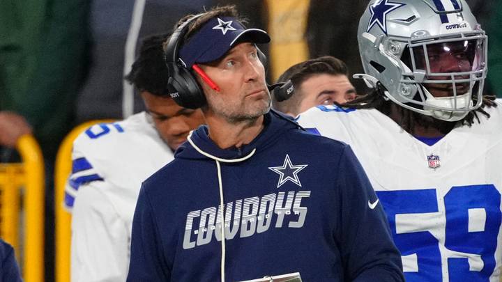 Dallas Cowboys head coach Brian Schottenheimer looks on during the first half against the Green Bay Packers at Lambeau Field. Dallas Cowboys head coach Brian Schottenheimer looks on during the first half against the Green Bay Packers at Lambeau Field.