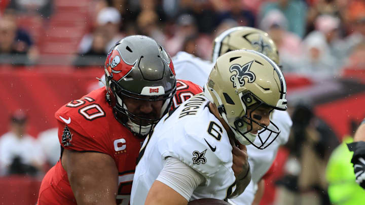 New Orleans Saints quarterback Tyler Shough (6) is sacked by Tampa Bay Buccaneers defensive tackle Vita Vea (50) New Orleans Saints quarterback Tyler Shough (6) is sacked by Tampa Bay Buccaneers defensive tackle Vita Vea (50)