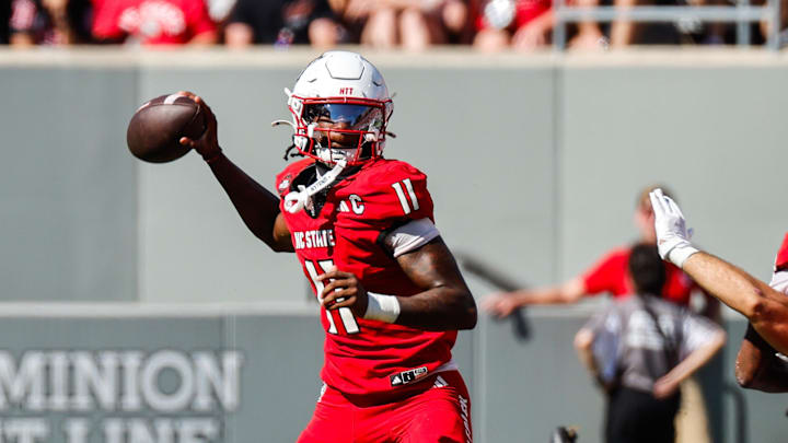 Oct 4, 2025; Raleigh, North Carolina, USA; NC State Wolfpack quarterback CJ Bailey (11) prepares to throw the ball during the first half of the game against Campbell Fighting Camels at Carter-Finley Stadium. Mandatory Credit: Jaylynn Nash-Imagn Images Oct 4, 2025; Raleigh, North Carolina, USA; NC State Wolfpack quarterback CJ Bailey (11) prepares to throw the ball during the first half of the game against Campbell Fighting Camels at Carter-Finley Stadium. Mandatory Credit: Jaylynn Nash-Imagn Images