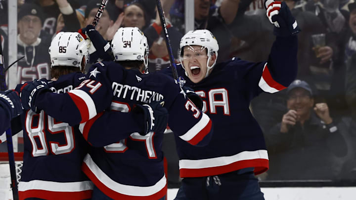 Feb 20, 2025; Boston, MA, USA; [Imagn Images direct customers only]  Team USA forward Brady Tkachuk (7) and forward Auston Matthews (34) celebrate defenseman Jake Sanderson (85) goal against Team Canada during the second period during the 4 Nations Face-Off ice hockey championship game at TD Garden. Mandatory Credit: Winslow Townson-Imagn Images