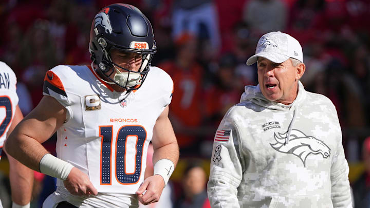 Nov 10, 2024; Kansas City, Missouri, USA; Denver Broncos quarterback Bo Nix (10) talks with head coach Sean Payton against the Kansas City Chiefs prior to a game at GEHA Field at Arrowhead Stadium. Nov 10, 2024; Kansas City, Missouri, USA; Denver Broncos quarterback Bo Nix (10) talks with head coach Sean Payton against the Kansas City Chiefs prior to a game at GEHA Field at Arrowhead Stadium.