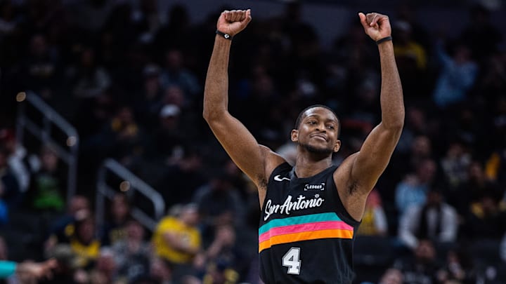 Jan 2, 2026; Indianapolis, Indiana, USA; San Antonio Spurs guard De'Aaron Fox (4) celebrates a made basket in the second half against the Indiana Pacers at Gainbridge Fieldhouse.