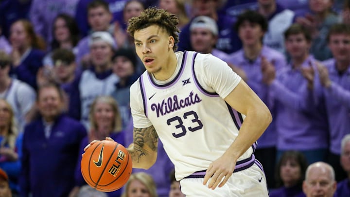 Feb 8, 2025; Manhattan, Kansas, USA; Kansas State Wildcats forward Coleman Hawkins (33) brings the ball up court during the first half against the Kansas Jayhawks at Bramlage Coliseum. Mandatory Credit: Scott Sewell-Imagn Images