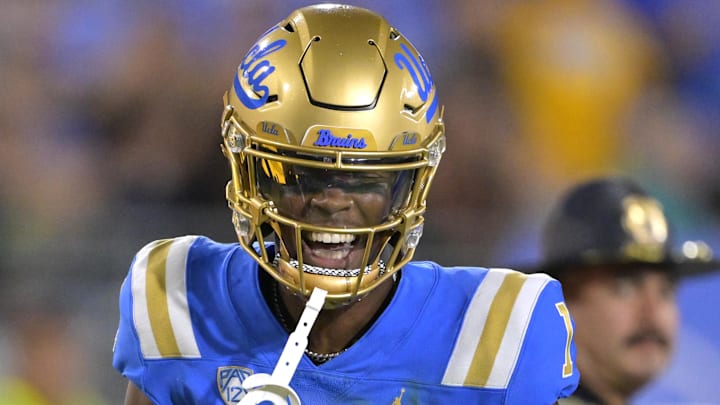 Sep 2, 2023; Pasadena, California, USA; UCLA Bruins wide receiver J. Michael Sturdivant (1) celebrates after a completion on a long pass from quarterback Dante Moore (3) in the first half against the Coastal Carolina Chanticleers at Rose Bowl. Mandatory Credit: Jayne Kamin-Oncea-Imagn Images Sep 2, 2023; Pasadena, California, USA; UCLA Bruins wide receiver J. Michael Sturdivant (1) celebrates after a completion on a long pass from quarterback Dante Moore (3) in the first half against the Coastal Carolina Chanticleers at Rose Bowl. Mandatory Credit: Jayne Kamin-Oncea-Imagn Images