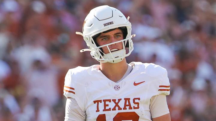 Texas Longhorns quarterback Arch Manning (16) reacts during the game against the Oklahoma Sooners at the Cotton Bowl. Texas Longhorns quarterback Arch Manning (16) reacts during the game against the Oklahoma Sooners at the Cotton Bowl.