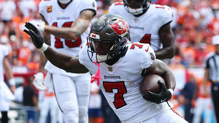 Sep 22, 2024; Tampa, Florida, USA; Tampa Bay Buccaneers running back Bucky Irving (7) runs with the ball against the Denver Broncos during the first half at Raymond James Stadium. Mandatory Credit: Kim Klement Neitzel-Imagn Images Sep 22, 2024; Tampa, Florida, USA; Tampa Bay Buccaneers running back Bucky Irving (7) runs with the ball against the Denver Broncos during the first half at Raymond James Stadium. Mandatory Credit: Kim Klement Neitzel-Imagn Images