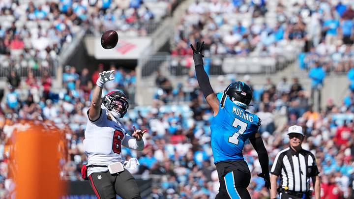  Tampa Bay Buccaneers quarterback Baker Mayfield (6) makes a pass for a touchdown against Carolina Panthers safety Tre'von Moehrig