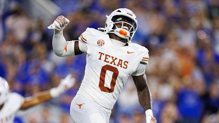 Texas Longhorns linebacker Anthony Hill Jr. (0) celebrates after the Kentucky Wildcats fail to score in overtime at Kroger Field.