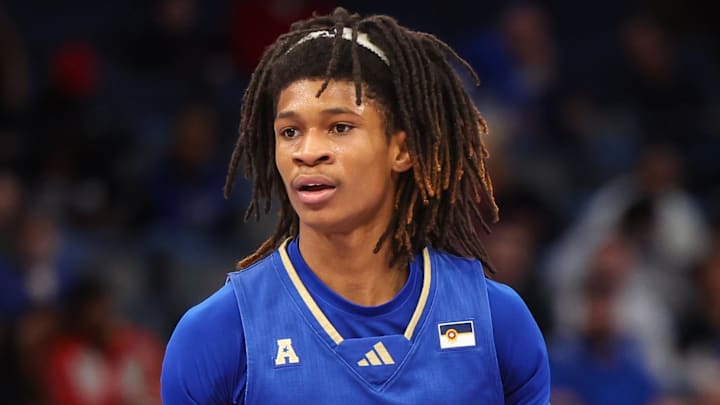 Feb 5, 2025; Memphis, Tennessee, USA; Tulsa Golden Hurricane guard Tyshawn Archie (8) dribbles the ball against the Memphis Tigers during the second half at FedExForum. Mandatory Credit: Wesley Hale-Imagn Images