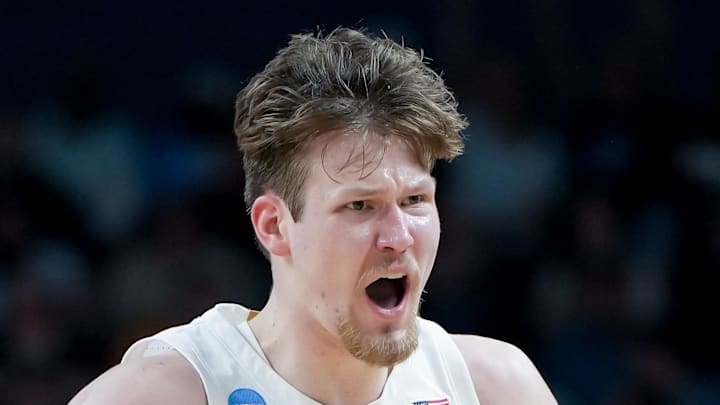 Mar 19, 2026; Greenville, SC, USA; North Carolina Tar Heels center Henri Veesaar (13) celebrates after a play against the VCU Rams in the first half of a first round game of the men's 2026 NCAA Tournament at Bon Secours Wellness Arena. Mandatory Credit: Bob Donnan-Imagn Images Mar 19, 2026; Greenville, SC, USA; North Carolina Tar Heels center Henri Veesaar (13) celebrates after a play against the VCU Rams in the first half of a first round game of the men's 2026 NCAA Tournament at Bon Secours Wellness Arena. Mandatory Credit: Bob Donnan-Imagn Images