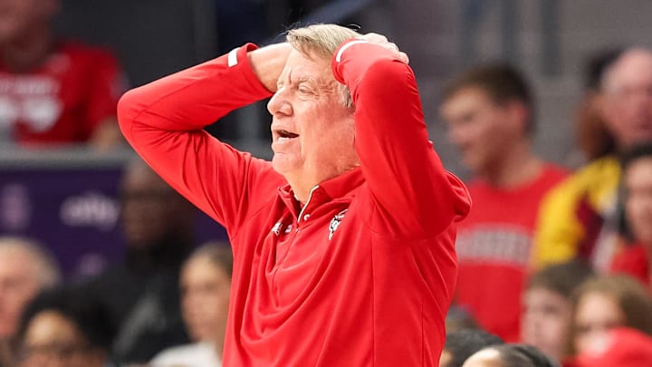 Nov 9, 2025; Charlotte, North Carolina, USA; NC State Wolfpack head coach Wes Moore reacts to a play against the Southern California Trojans during the second quarter of the Ally Tipoff game at Spectrum Center. Mandatory Credit: Cory Knowlton-Imagn Images Nov 9, 2025; Charlotte, North Carolina, USA; NC State Wolfpack head coach Wes Moore reacts to a play against the Southern California Trojans during the second quarter of the Ally Tipoff game at Spectrum Center. Mandatory Credit: Cory Knowlton-Imagn Images