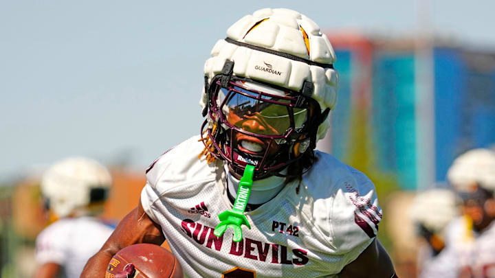 Arizona State defensive back Keith Abney II (1) runs back after a catch during the first day of fall practice in Tempe, Ariz. on July 30, 2025.