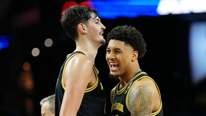 Apr 4, 2026; Indianapolis, IN, USA; Michigan Wolverines center Aday Mara (15) and forward Yaxel Lendeborg (23) react during the second half in a semifinal of the Final Four of the men's 2026 NCAA Tournament at Lucas Oil Stadium. Mandatory Credit: Bob Donnan-Imagn Images