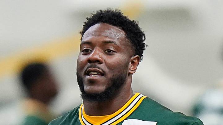 Green Bay Packers linebacker Zaire Franklin stretches during minicamp