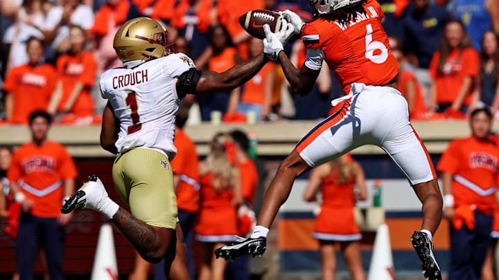 Oct 5, 2024; Charlottesville, Virginia, USA; Boston College Eagles linebacker Daveon Crouch (1) breaks up a pass intended for Virginia Cavaliers wide receiver JR Wilson (6) during the first quarter at Scott Stadium. Mandatory Credit: Peter Casey-Imagn Images Oct 5, 2024; Charlottesville, Virginia, USA; Boston College Eagles linebacker Daveon Crouch (1) breaks up a pass intended for Virginia Cavaliers wide receiver JR Wilson (6) during the first quarter at Scott Stadium. Mandatory Credit: Peter Casey-Imagn Images