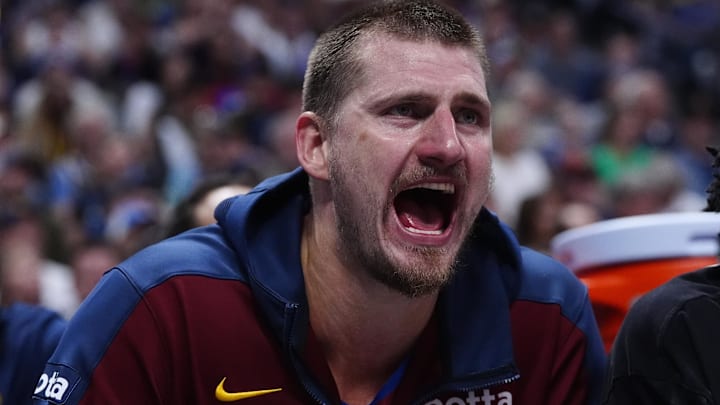 May 3, 2025; Denver, Colorado, USA; Denver Nuggets center Nikola Jokic (15) reacts from the bench in the third quarter against the LA Clippers during game seven of first round for the 2025 NBA Playoffs at Ball Arena. Mandatory Credit: Ron Chenoy-Imagn Images