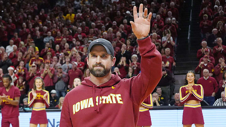 Iowa State football coach Jimmy Rogers speaks during a timeout in the first half in the Iowa State and Iowa men’s basketball Cy-Hawk series at Hilton coliseum on Dec. 11, 2025, in Ames, Iowa.