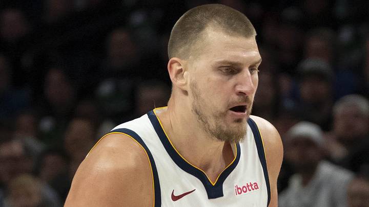 Apr 30, 2026; Minneapolis, Minnesota, USA; Denver Nuggets center Nikola Jokic (15) dribbles the ball against the Minnesota Timberwolves in the second half during game six of the first round of the 2026 NBA Playoffs at Target Center. Mandatory Credit: Jesse Johnson-Imagn Images