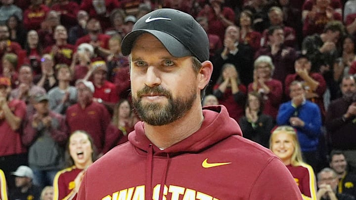 Iowa State football coach Jimmy Rogers speaks during a timeout in the first half in the Iowa State and Iowa men’s basketball Cy-Hawk series at Hilton coliseum on Dec. 11, 2025, in Ames, Iowa.