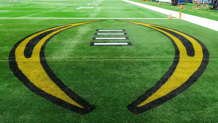 The College Football Playoff logo is painted in the endzone prior to the Cotton Bowl between the Ohio State Buckeyes and the Miami Hurricanes at AT&T Stadium in Arlington, Texas on Dec. 31, 2025. The College Football Playoff logo is painted in the endzone prior to the Cotton Bowl between the Ohio State Buckeyes and the Miami Hurricanes at AT&T Stadium in Arlington, Texas on Dec. 31, 2025.